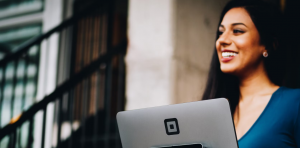 girl holding gray laptop explaining about customer experience